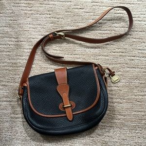 Dooney & Bourke Vintage pebble black leather crossbody with brown trim and strap